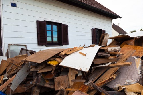 Loading waste into a domestic skip